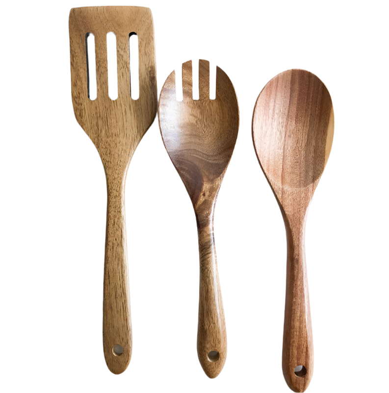 Three wooden kitchen utensils on a white background